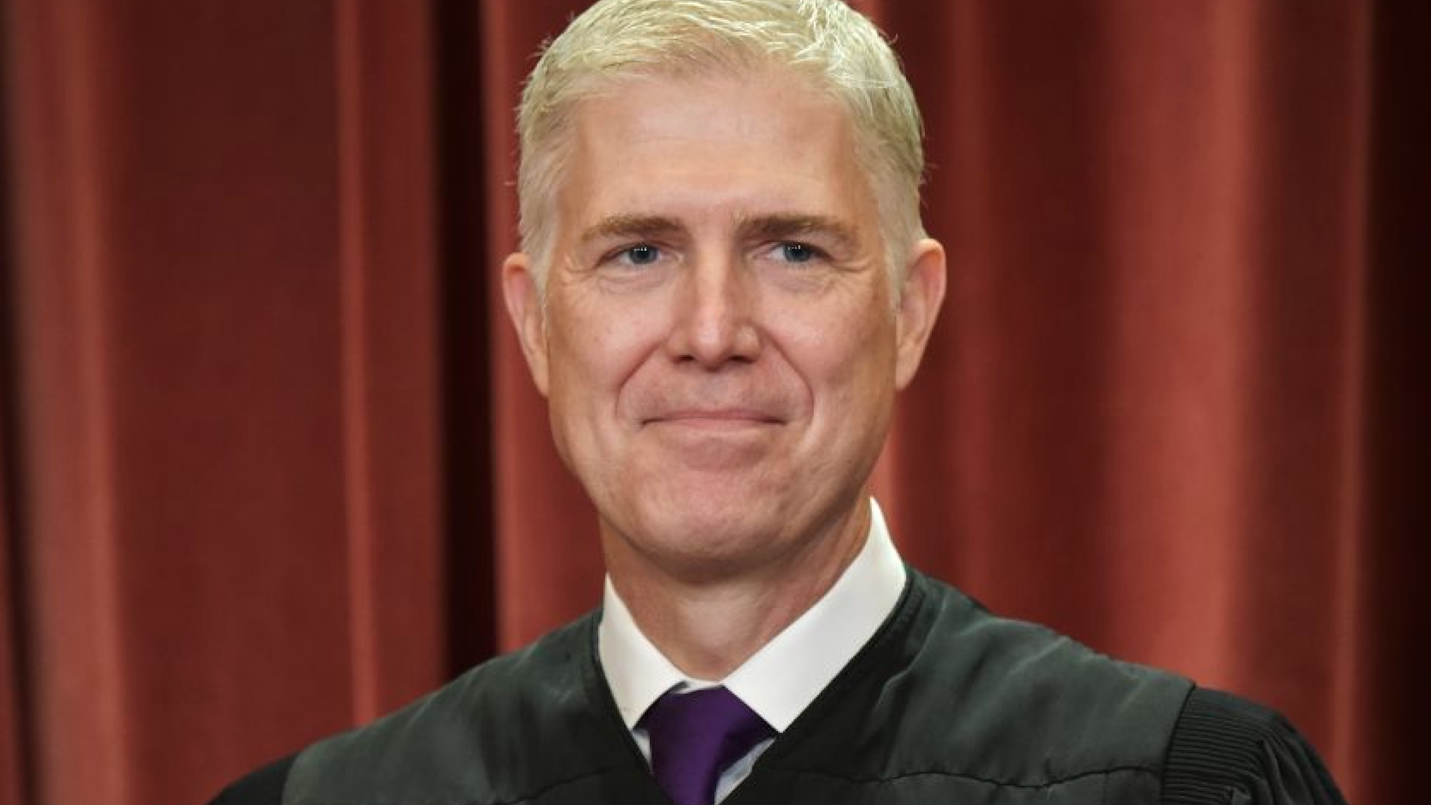 Associate Justice Neil Gorsuch poses for the official group photo at the US Supreme Court in Washington, DC on November 30, 2018.