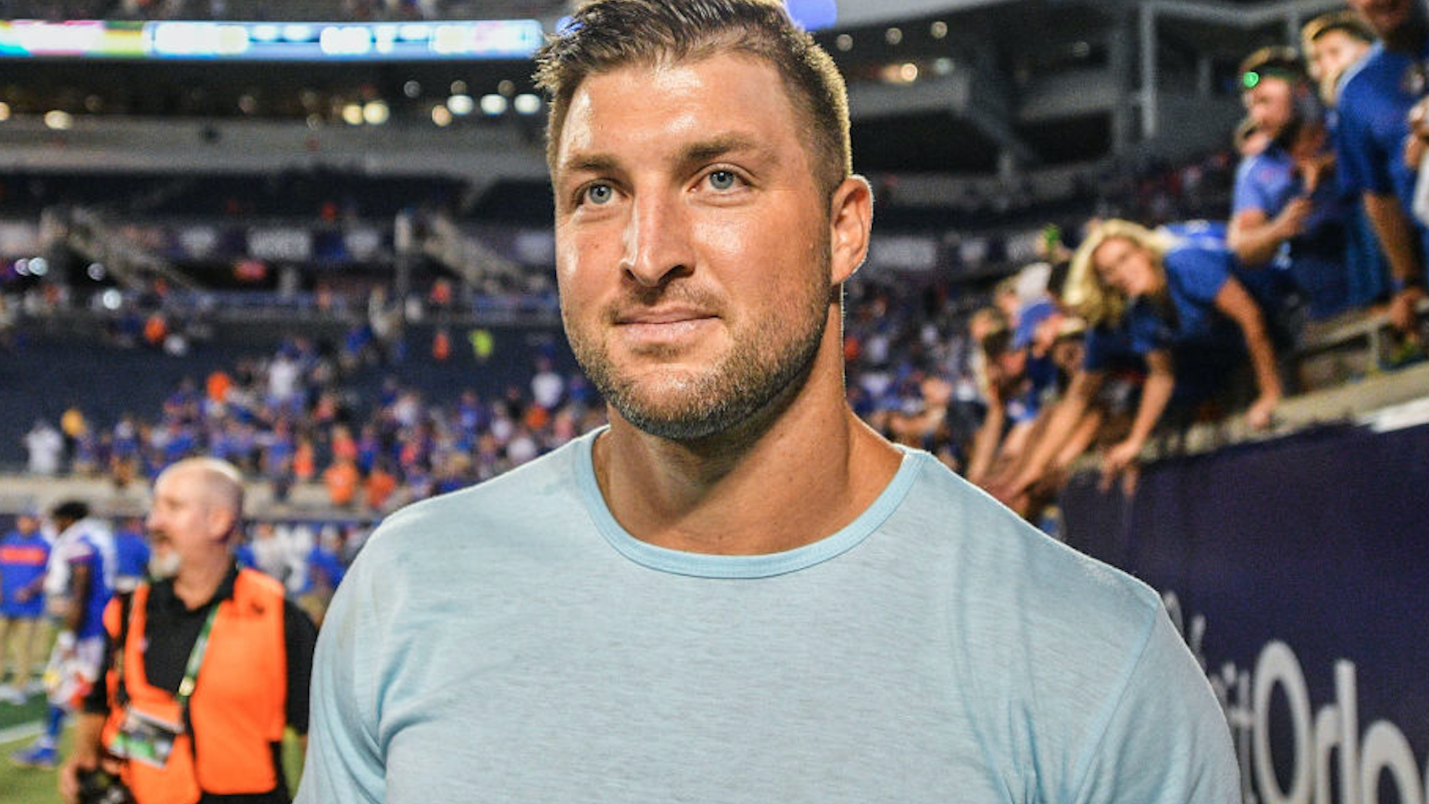 ORLANDO, FL - AUGUST 24: Florida Gators alumni Tim Tebow attends the game between the Florida Gators and the Miami Hurricanes in the Camping World Kickoff at Camping World Stadium on August 24, 2019 in Orlando, Florida.