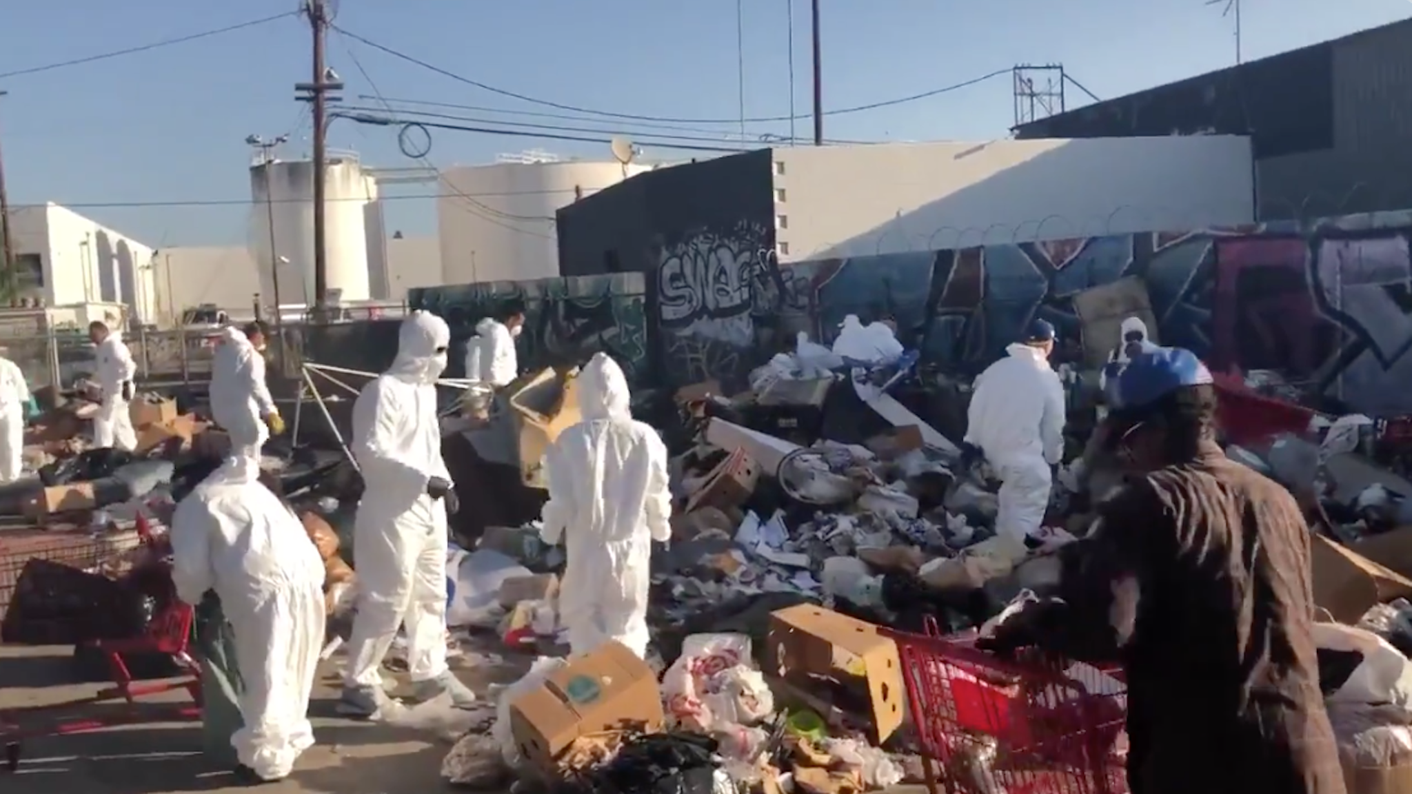 Activists help clean up trash-strewn Los Angeles.