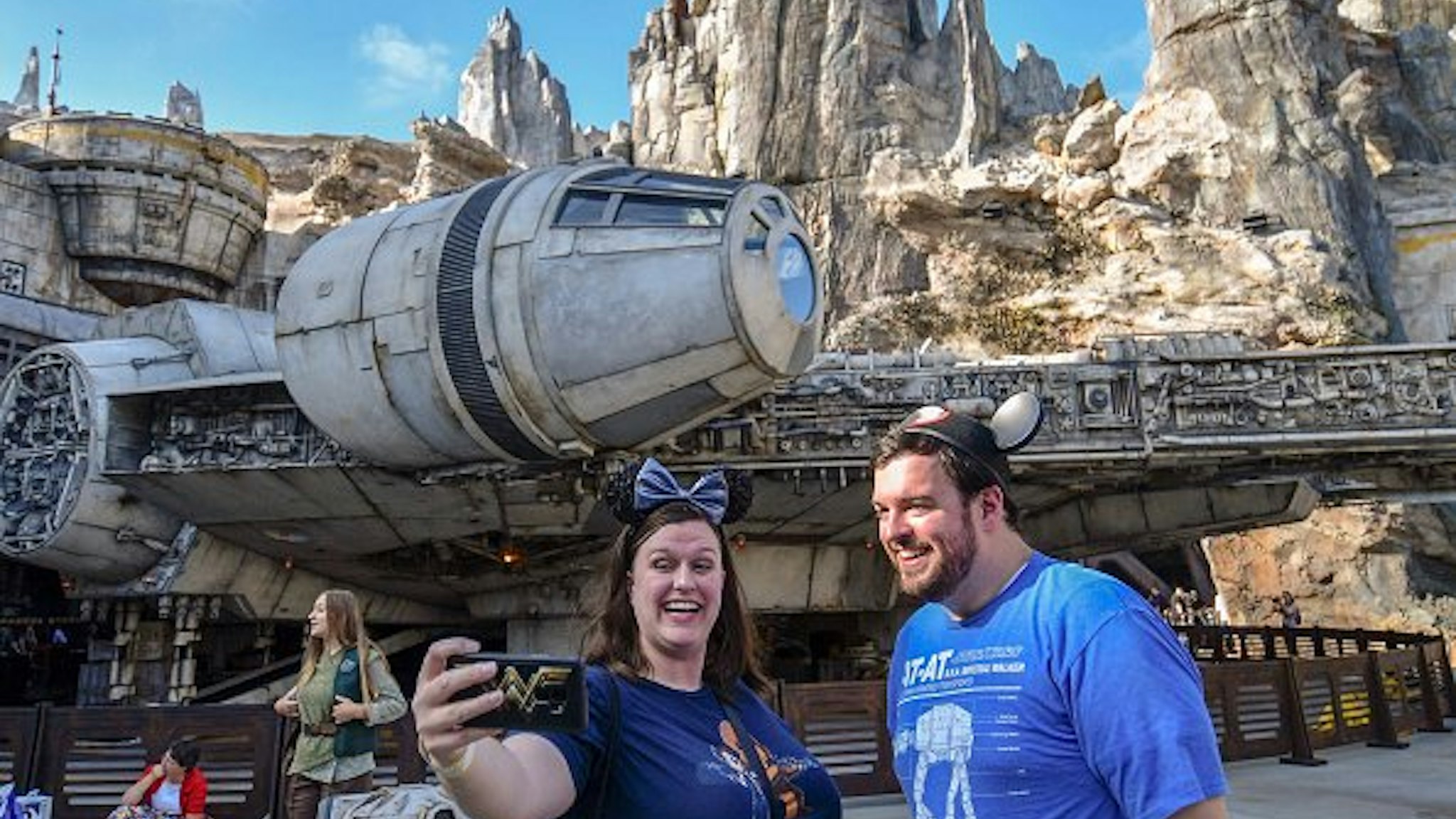 Nycole Tylka, and her brother, Nate Tylka take selfies in front of the Millennium Falcon on opening day at Star Wars: Galaxy"u2019s Edge at Disneyland in Anaheim, CA, on Friday, May 31, 2019