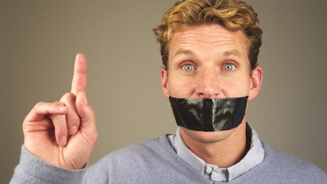 Man with tape over his mouth.