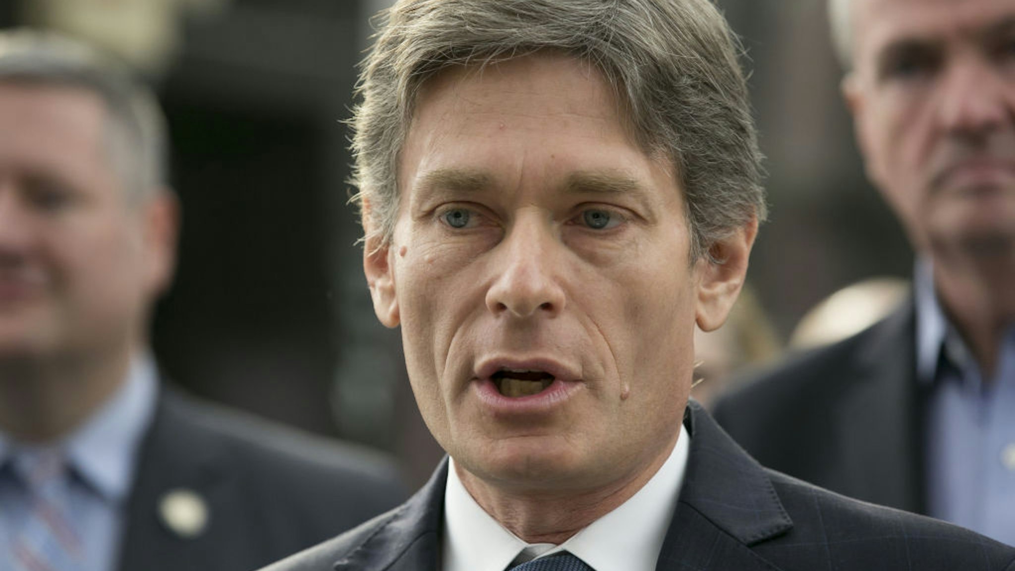 Tom Malinowski speaks during a news conference before the signing of a NJ Transit reform bill