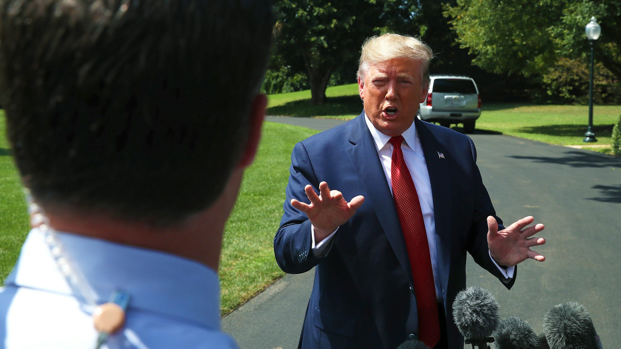 WASHINGTON, DC - AUGUST 21: U.S. President Donald Trump speaks to the media before departing from the White House on August 21, 2019 in Washington, DC. President Trump spoke on several topics including the U.S. economy and why he canceled his trip to Denmark. (