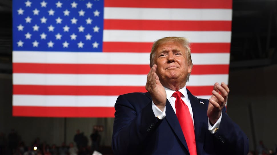 US-POLITICS-VOTE-ELECTION-TRUMP US President Donald Trump speaks during a "Keep America Great" campaign rally at the SNHU Arena in Manchester, New Hampshire, on August 15, 2019.