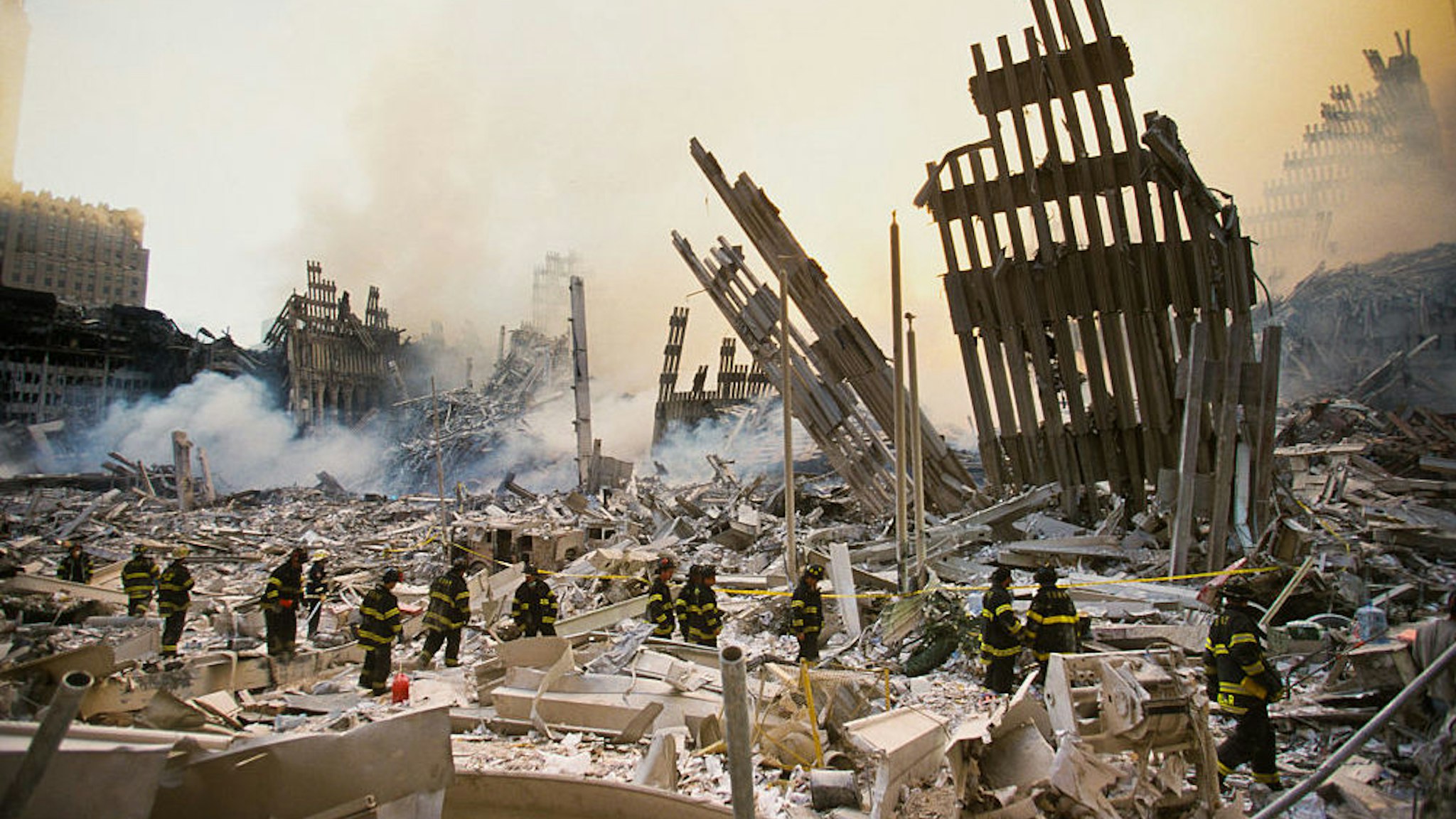 NEW YORK, NY - SEPTEMBER 12, 2001: The rubble of the World Trade Center smoulders following a terrorist attack 11 September 2001 in New York. A hijacked plane crashed into and destroyed the landmark structure.