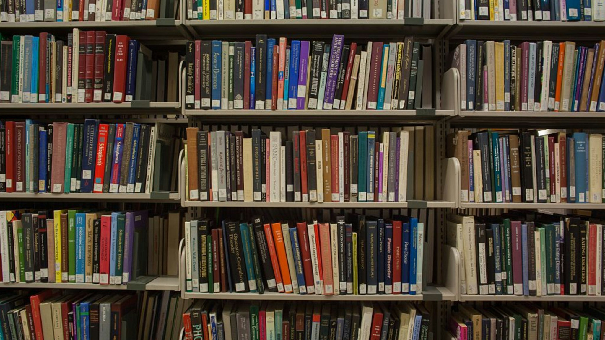 Shelves full of books on C-level, a quiet floor for studying, in the Milton S. Eisenhower Library on the Homewood campus of the Johns Hopkins University in Baltimore, Maryland, 2014.