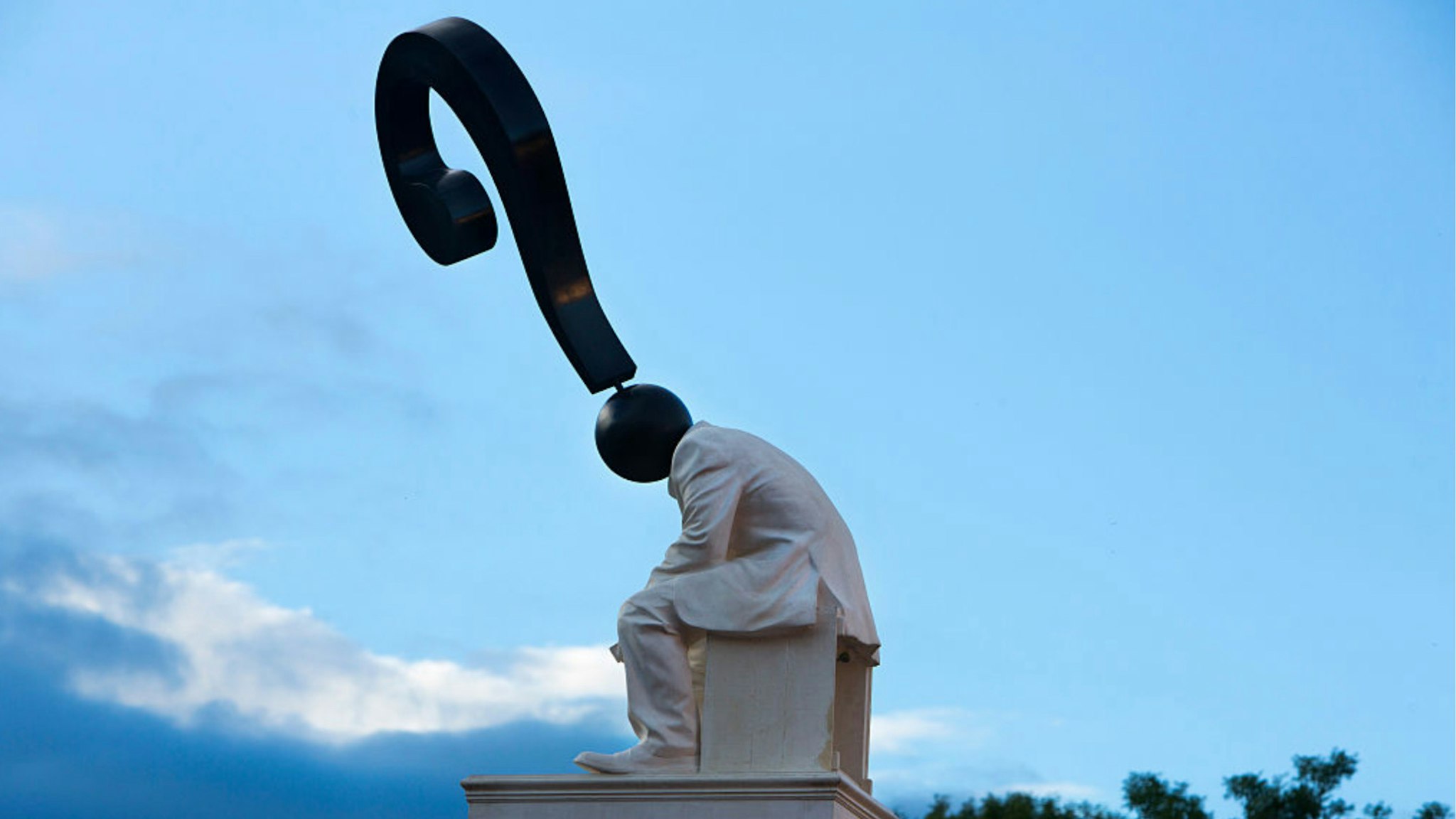 Sculpture by the artist Hugo Farmer greets arrivals to the Shangri La field, Glastonbury Festival, United Kingdom.