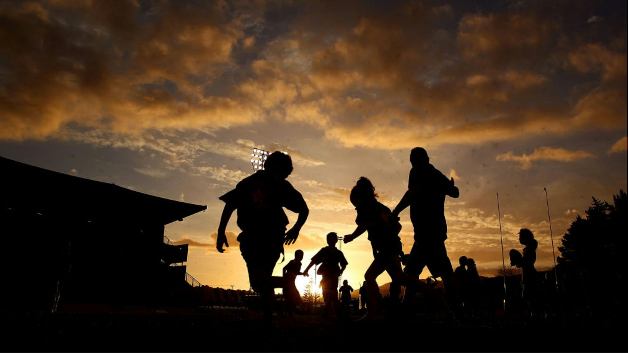 Kids playing. Children play Rippa Rugby before the round seven Mitre 10 Cup match between Northland and Otago at Toll Stadium on September 27, 2017 in Whangarei, New Zealand.