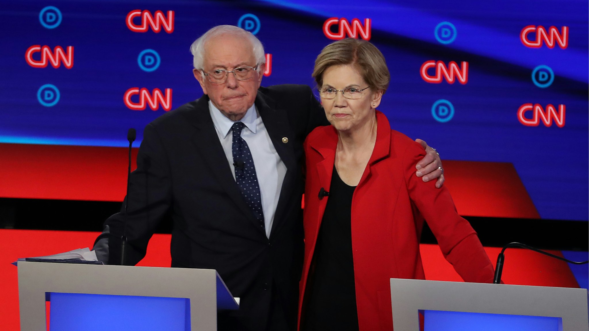 Democratic presidential candidate Sen. Bernie Sanders (I-VT) (L) and Sen. Elizabeth Warren (D-MA) embrace after the Democratic Presidential Debate at the Fox Theatre July 30, 2019 in Detroit, Michigan.