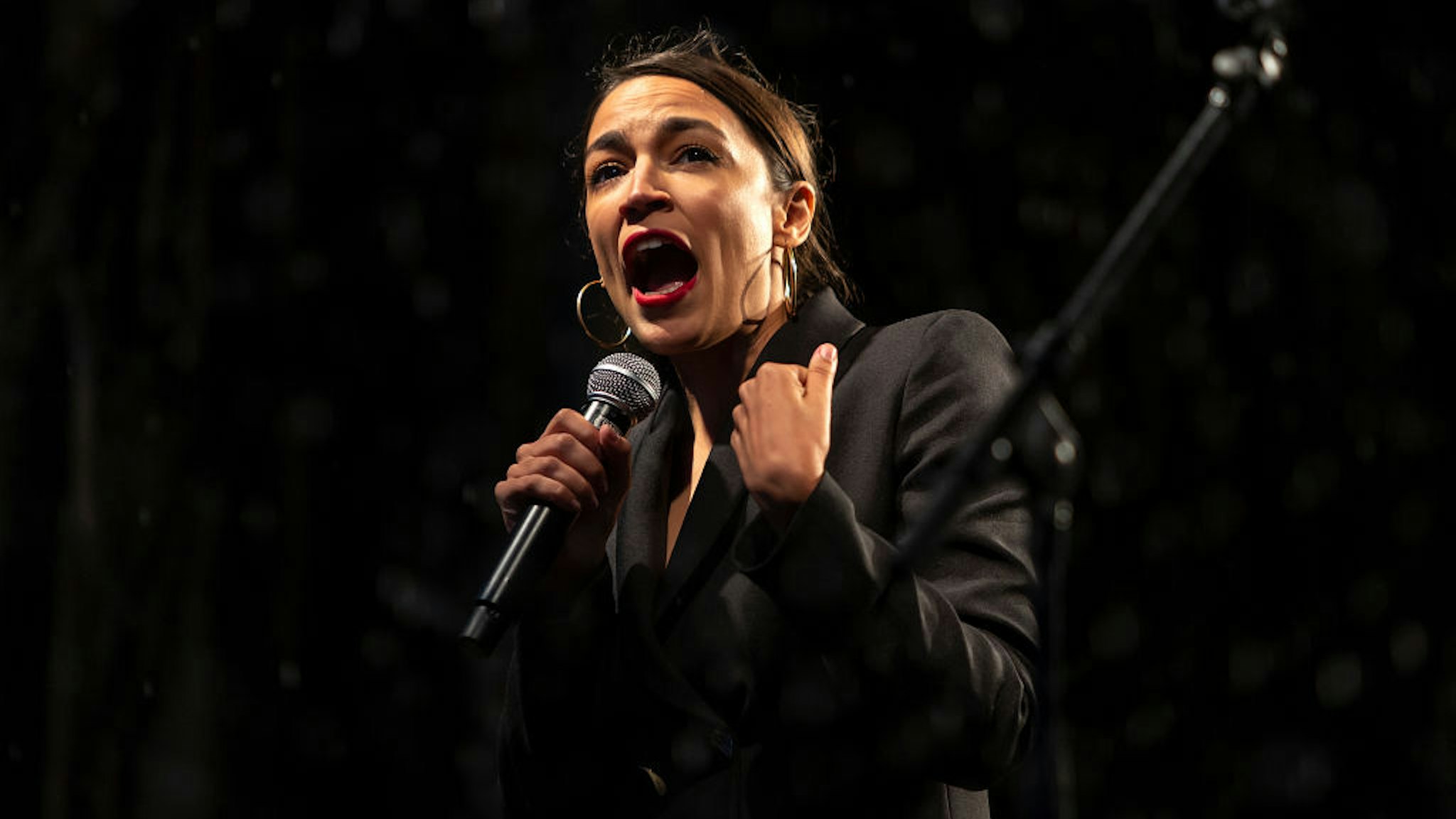 Alexandria Ocasio-Cortez speaks to the thousands of people who participated in the People Climate March