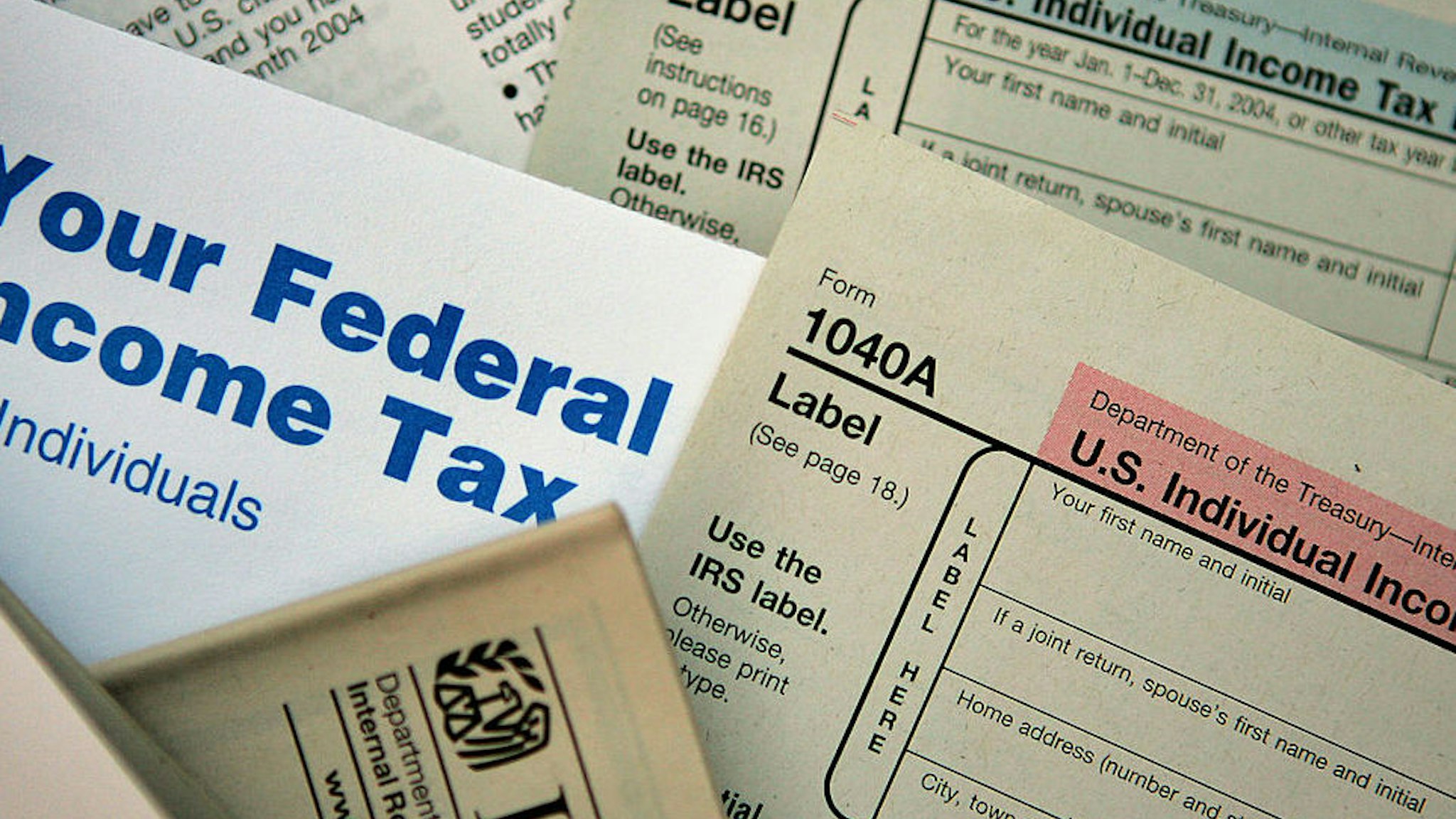 CHICAGO - NOVEMBER 1: Current federal tax forms are distributed at the offices of the Internal Revenue Service November 1, 2005 in Chicago, Illinois. A presidential panel today recommended a complete overhaul of virtually every tax law for individuals and businesses.
