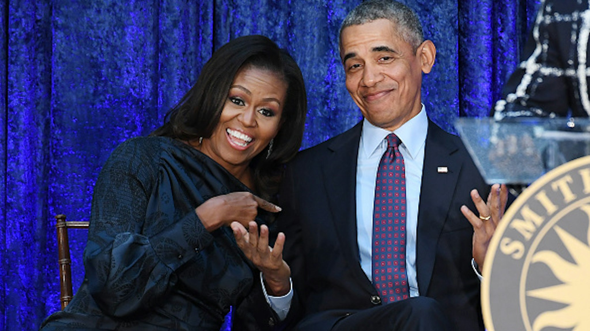 WASHINGTON, DC - FEBRUARY 12: Former First Lady Michelle Obama and former President Barack Obama are seen after their portraits were unveiled at the Smithsonian National Portrait Gallery on Monday February 12, 2018 in Washington, DC. The former President's portrait was painted by Kehinde Wiley while the former First Lady's portrait was painted by Amy Sherald.