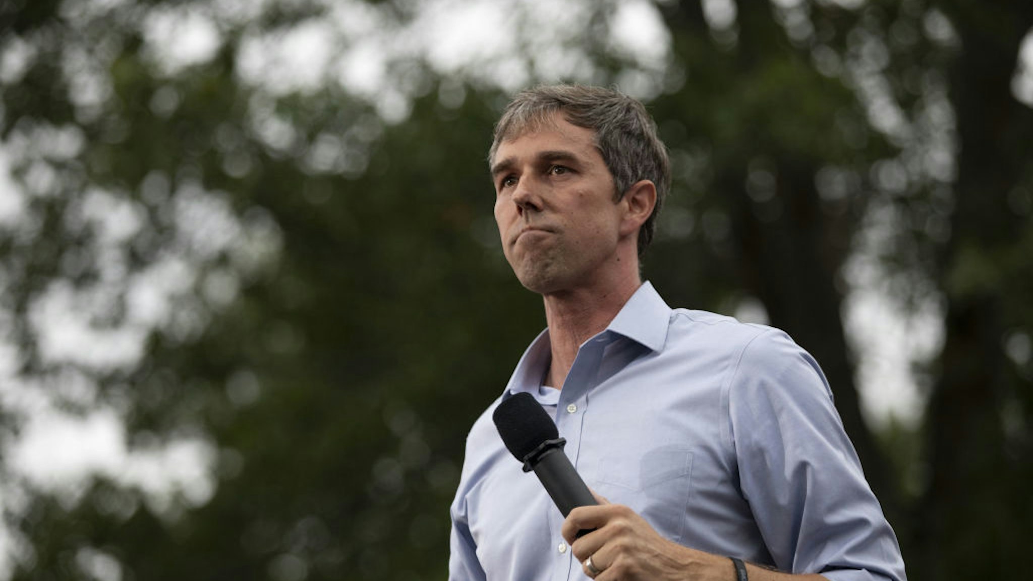 Beto O'Rourke pauses while speaking at the Polk County Steak Fry in Des Moines, Iowa,