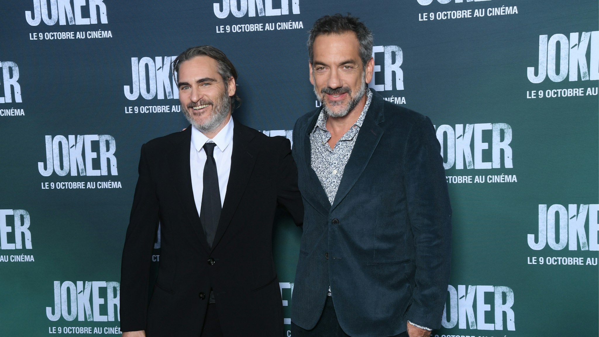 Actor Joaquin Phoenix and Director Todd Phillips attend the "Joker" Premiere at cinema UGC Normandie son September 23, 2019 in Paris, France.