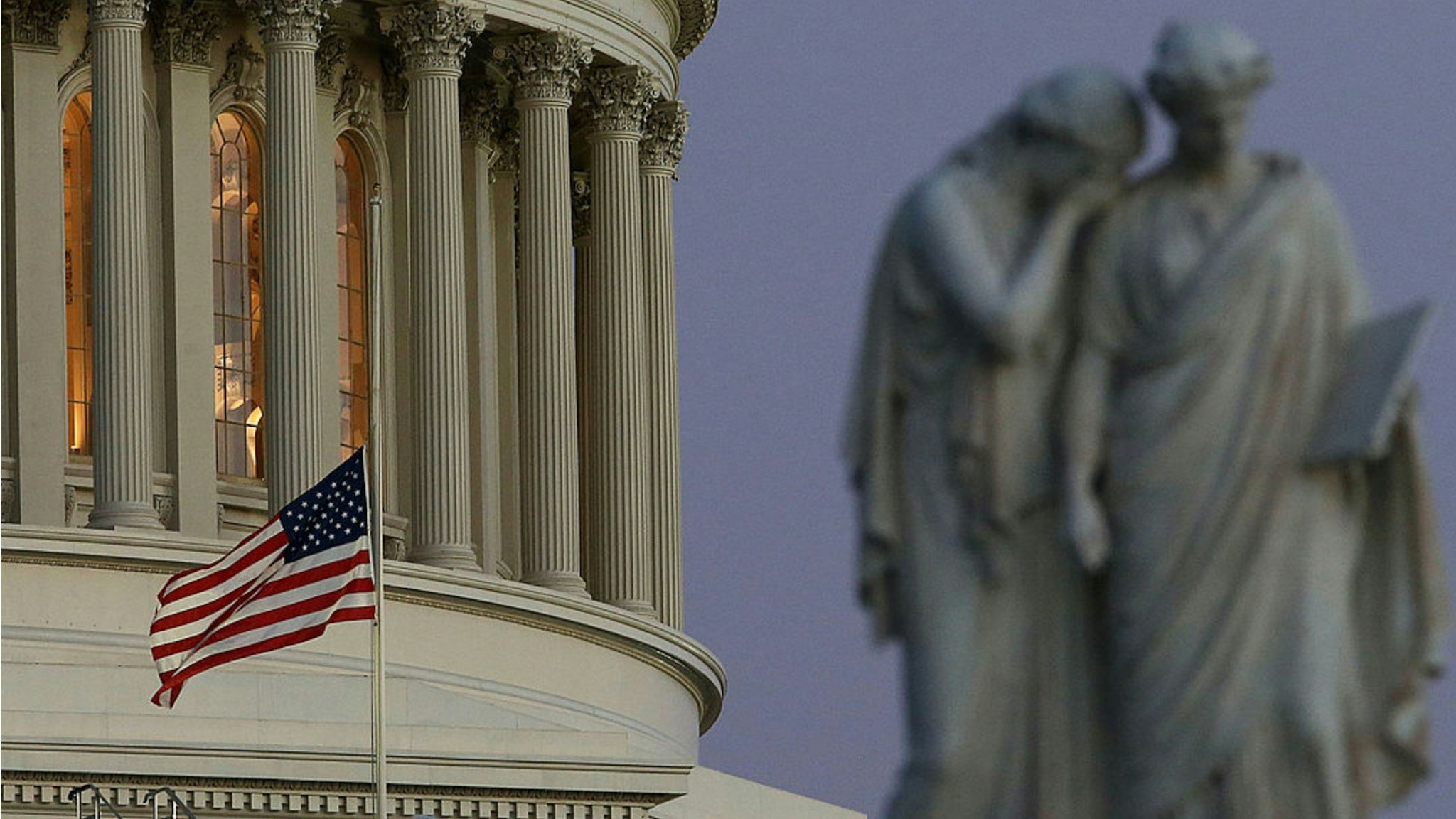 A flag at the U.S. Capitol flies at half staff after President Barack Obama ordered the action while speaking on the shootings at the Sandy Hook Elementary School December 14, 2012 in Washington, DC.