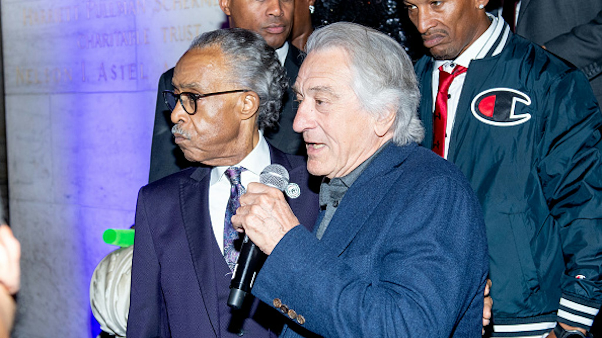 NEW YORK, NEW YORK - OCTOBER 03: Rev. Al Sharpton's with Robert De Niro on stage at Rev. Al Sharpton's 65th Birthday Celebration at New York Public Library - Stephen A Schwartzman Building on October 03, 2019 in New York City.