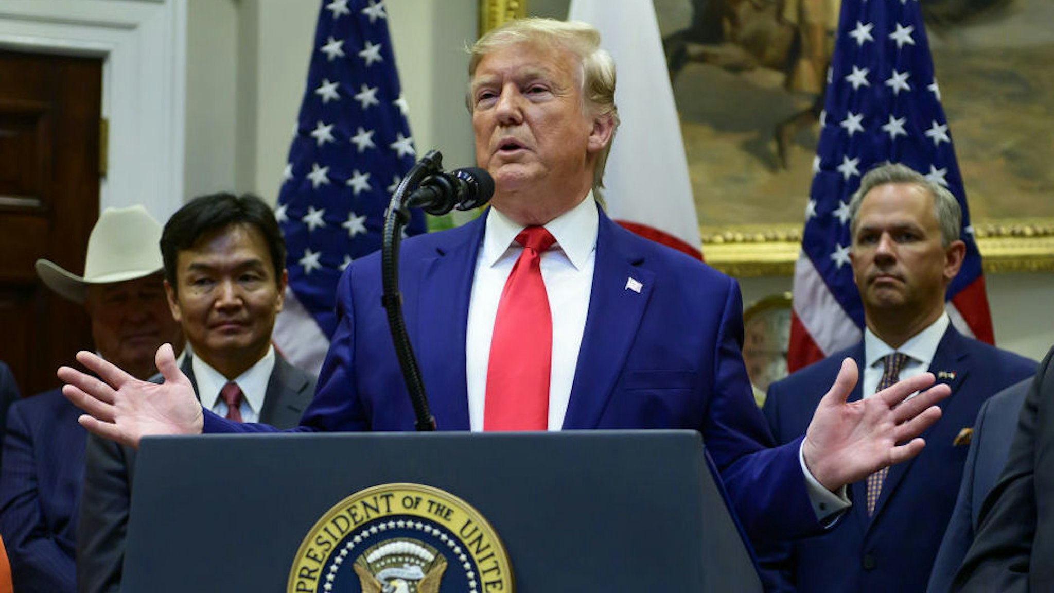 U.S. President Donald Trump speaks during a signing ceremony for the U.S.-Japan Trade Agreement and U.S.-Japan Digital Trade Agreement in the Roosevelt Room of the White House in Washington, D.C., U.S., on Monday, Oct. 7, 2019. The U.S. and Japan signed a limited trade deal intended to boost markets for American farmers and give Tokyo assurances, for now, that Trump won't impose tariffs on auto imports. Photographer: Ron Sachs/CNP/Bloomberg