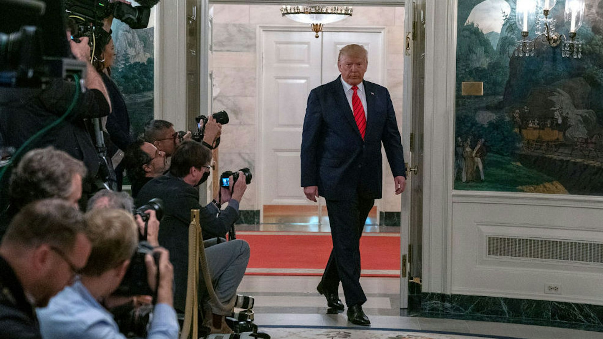 U.S. President Donald Trump enters the Diplomatic Reception Room of the White House to make a statement October 27, 2019 in Washington, DC. President Trump announced that ISIS leader Abu Bakr al-Baghdadi has been killed in a military operation in northwest Syria. (Photo by Tasos Katopodis/Getty Images)