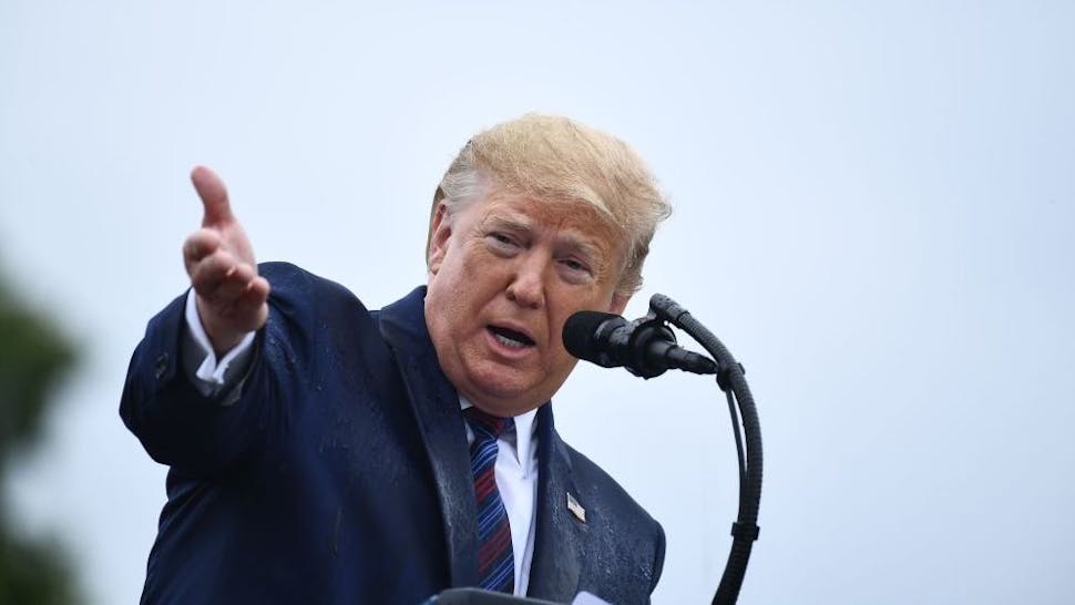 Donald Trump US President Donald Trump speaks during the Armed Forces Welcome Ceremony in honor of the Twentieth Chairman of the Joint Chiefs of Staff on September 30, 2019 at Summerall Field, Joint Base Myer-Henderson Hall, Virginia. (Photo by Brendan Smialowski / AFP) (Photo credit should read BRENDAN SMIALOWSKI/AFP/Getty Images)