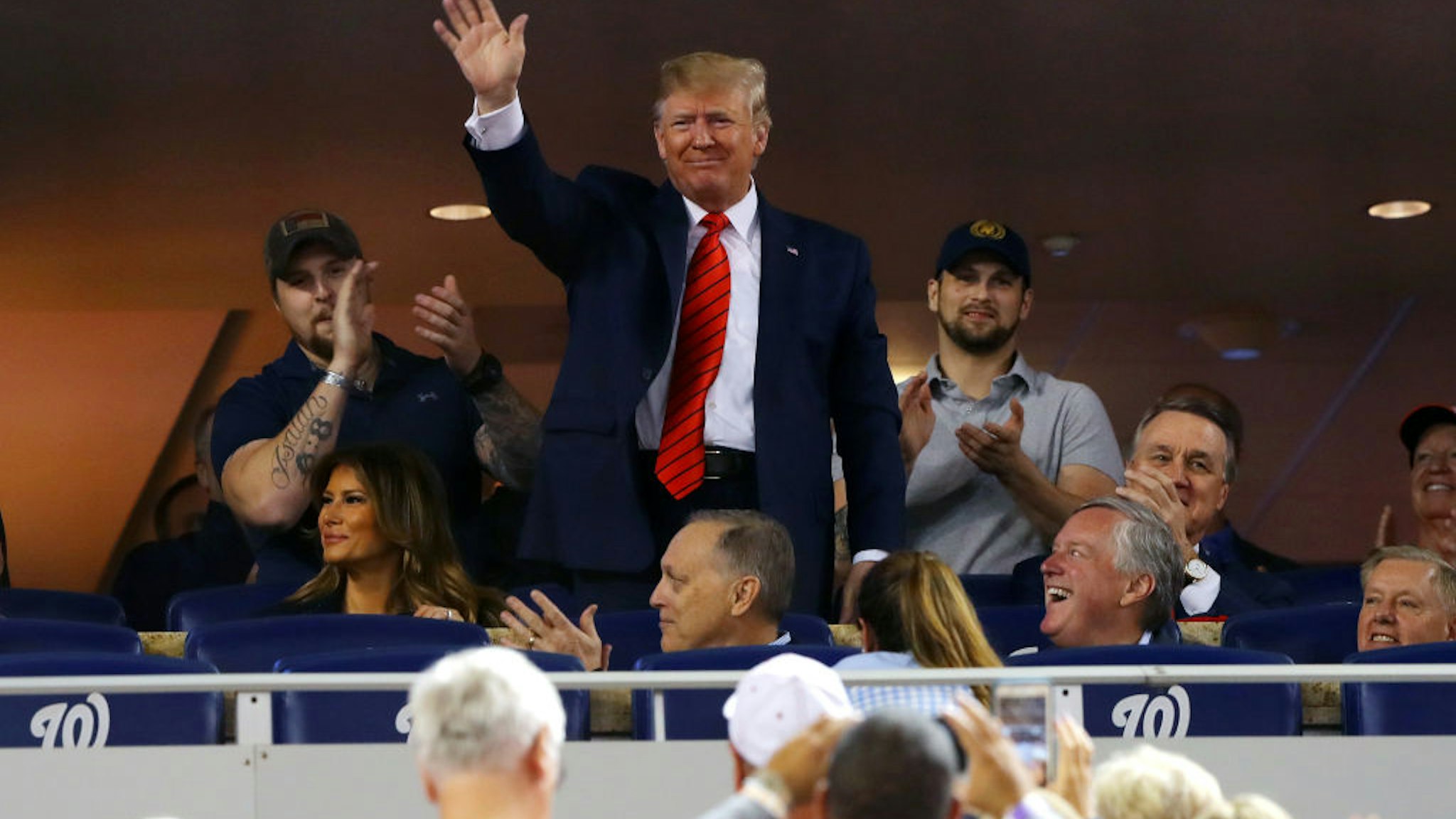 President Donald Trump acknowledges the crowd during Game 5 of the 2019 World Series