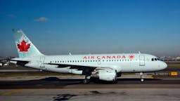 Air Canada jet. An Air Canada Express passenger jet lands at LaGuardia Airport in New York, New York.