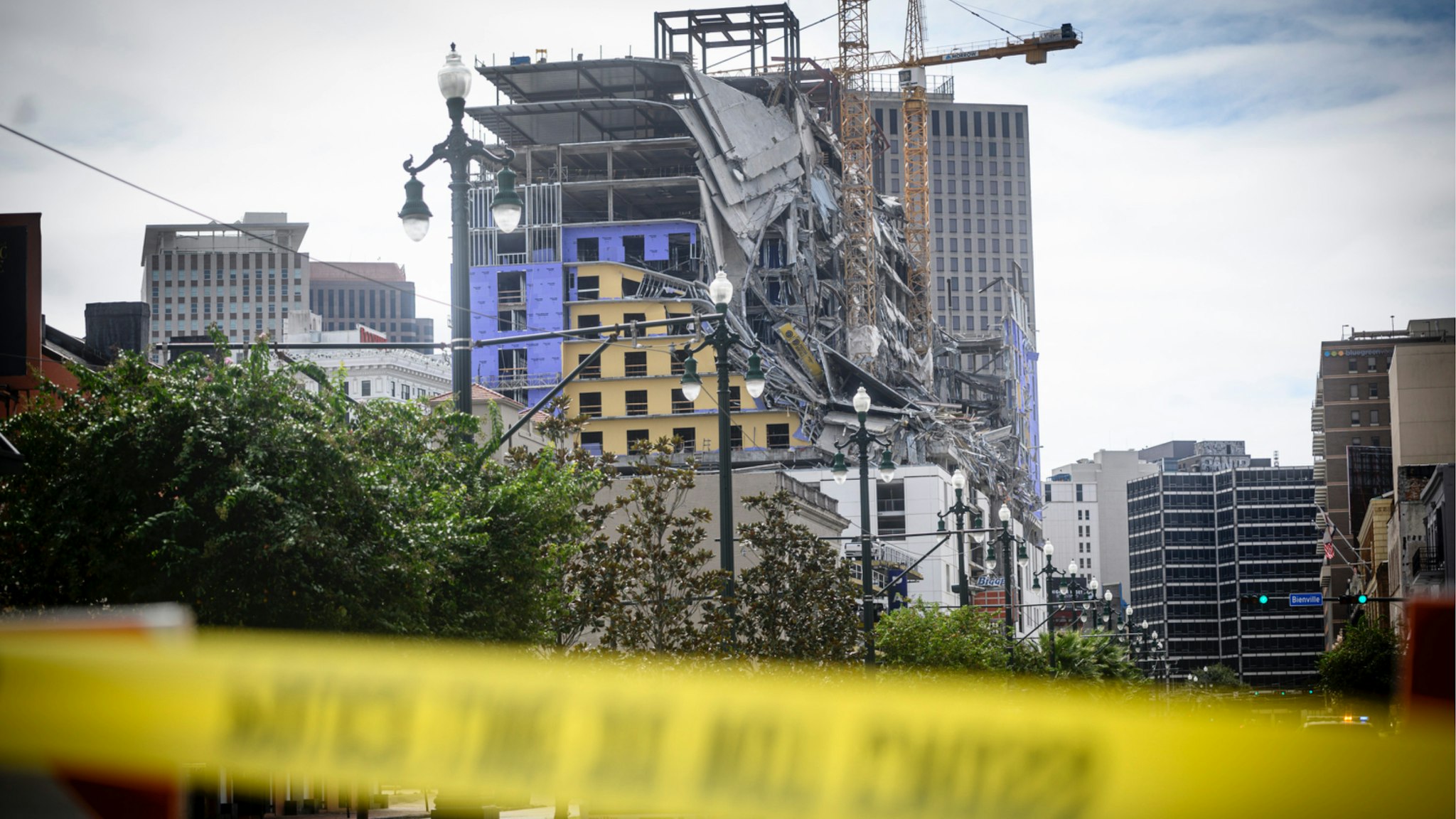 The Hard Rock Hotel partially collapsed onto Canal Street downtown New Orleans, Louisiana on October 12, 2019. - One person died and at least 18 others were injured Saturday when the top floors of a New Orleans hotel that was under construction collapsed, officials said.