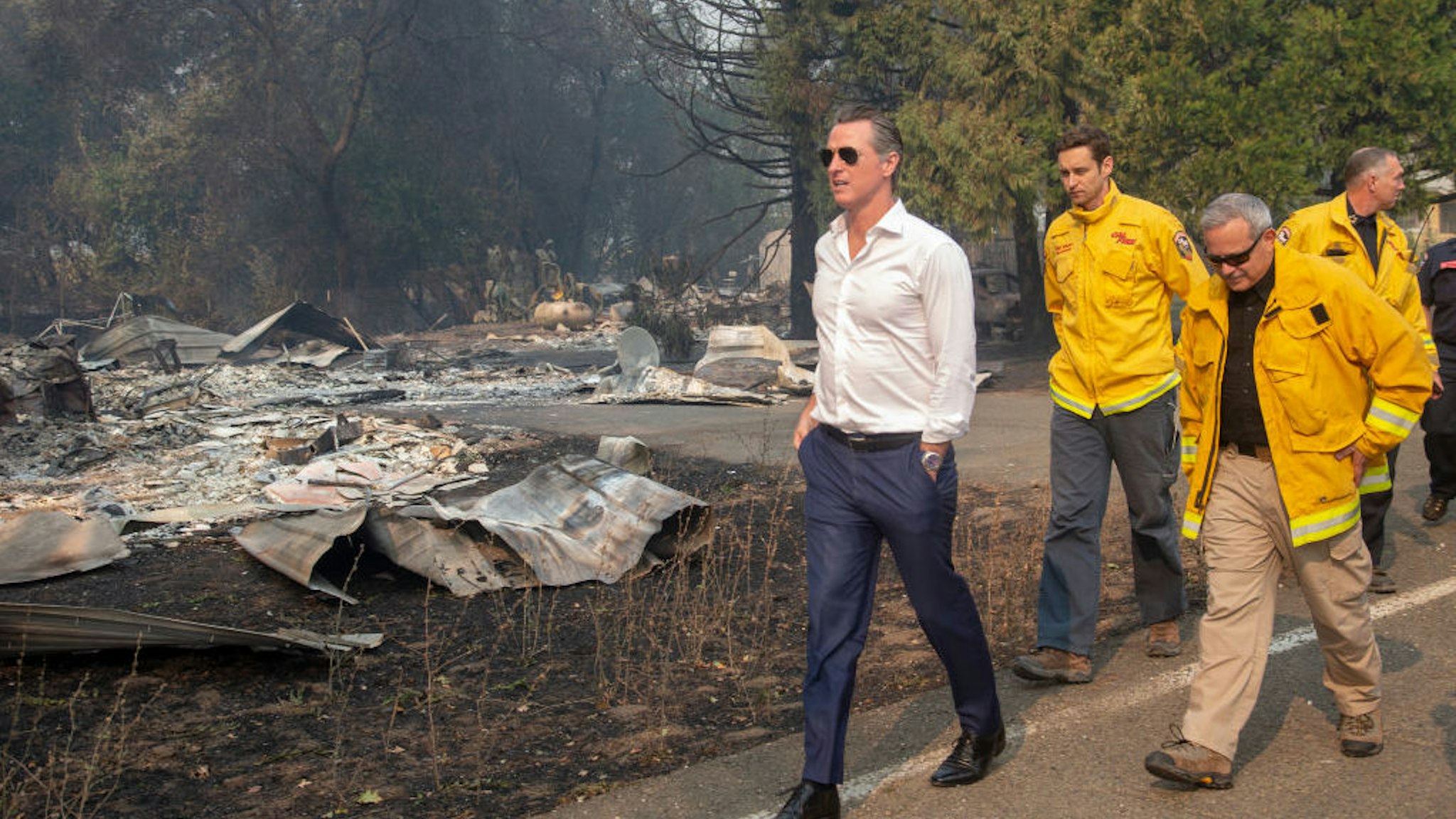 Gov. Gavin Newsom tours a home destroyed in the Kincade Fire, Friday, Oct. 25, 2019, in Geyserville, Calif. (Karl Mondon/MediaNews Group/The Mercury News via Getty Images)