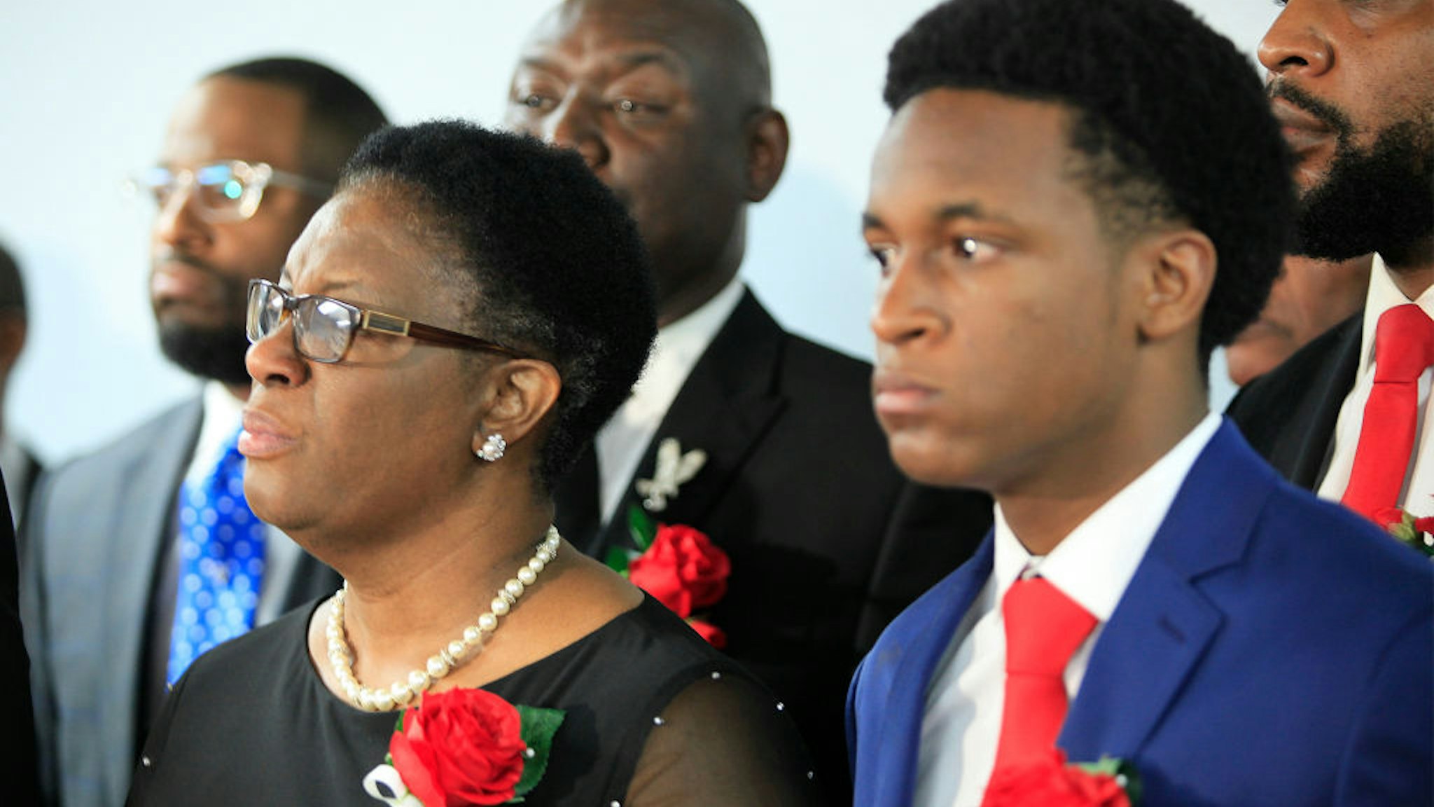 Allison Jean, mother of Botham Shem Jean, stands with family and church members of Greenville Avenue Church of Christ after the funeral service on September 13, 2018 in Richardson, Texas.