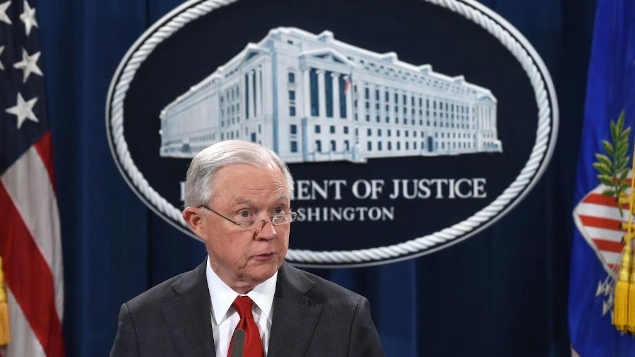 US Attorney General Jeff Sessions speaks during a press conference regarding the arrest of bombing suspect Cesar Sayoc in Florida, at the Department of Justice in Washington, DC on October 26, 2018. - The suspect has been charged with five federal crimes in connection with more than a dozen suspicious packages sent in a US mail bombing spree, Sessions said Friday.