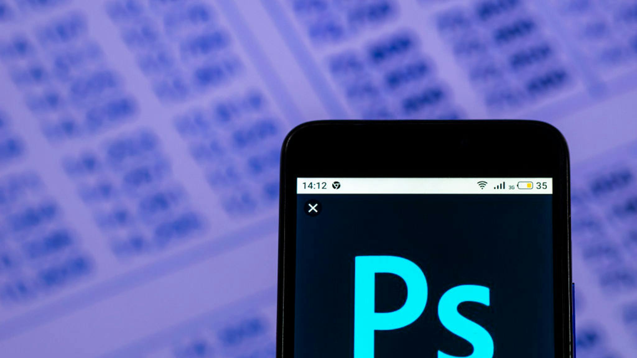 Adobe Photoshop Downloadable software logo seen displayed on In this photo illustration, the Adobe Photoshop Downloadable software logo seen displayed on a smartphone.