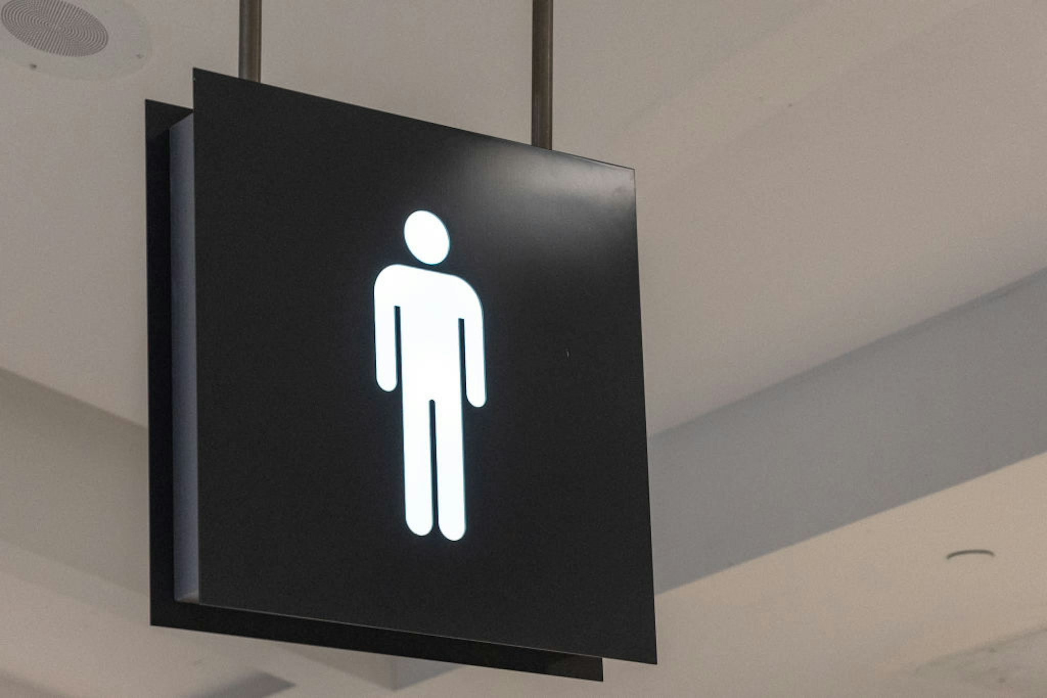 Public washroom or bathroom sign marking the facility is to be used by men.