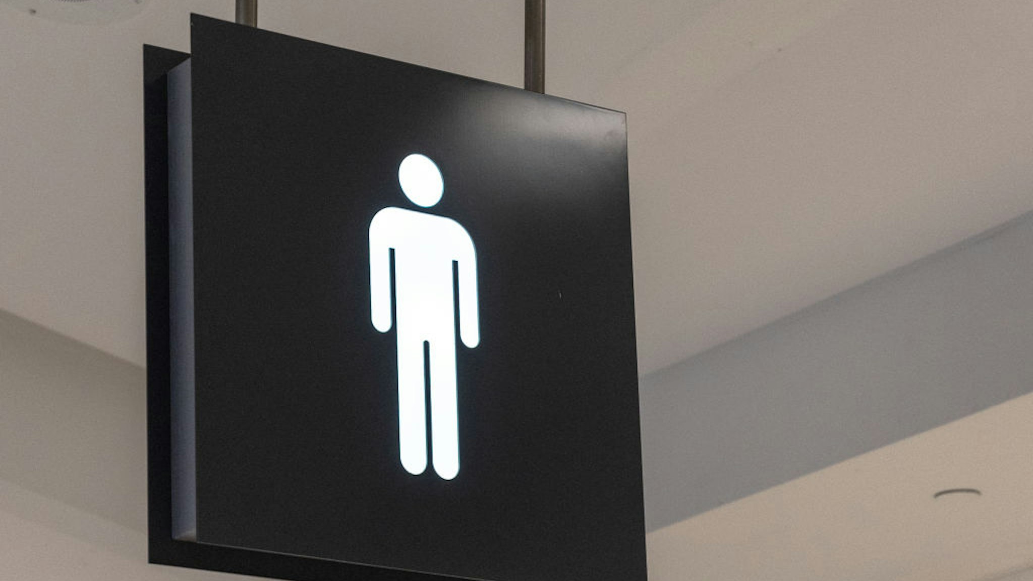 Public washroom or bathroom sign marking the facility is to be used by men.