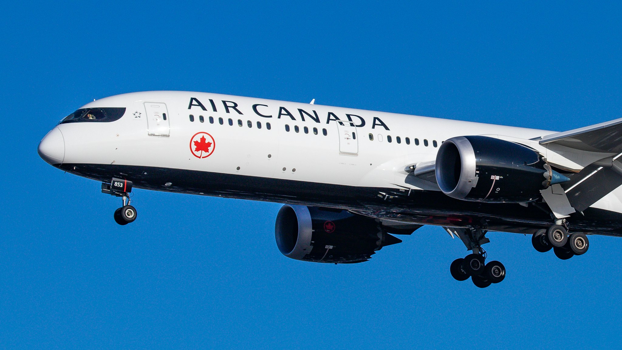 Air Canada Boeing 787-9 Dreamliner aircraft landing at London Heathrow International Airport LHR EGLL during a blue sky summer day in England, UK, on 2 August 2019. The airplane that is on final approach before the runway has 2x GEnx-1B jet engines and has the registration C-FVLQ. Air Canada AC ACA is the flag carrier and largest airline carrier of Canada and is a Star Alliance aviation alliance member. The airline connects the British capital to Calgary, Halifax, Montréal Trudeau, Ottawa, St. John's, Toronto Pearson and Vancouver airports. (Photo by Nicolas Economou/NurPhoto via Getty Images)