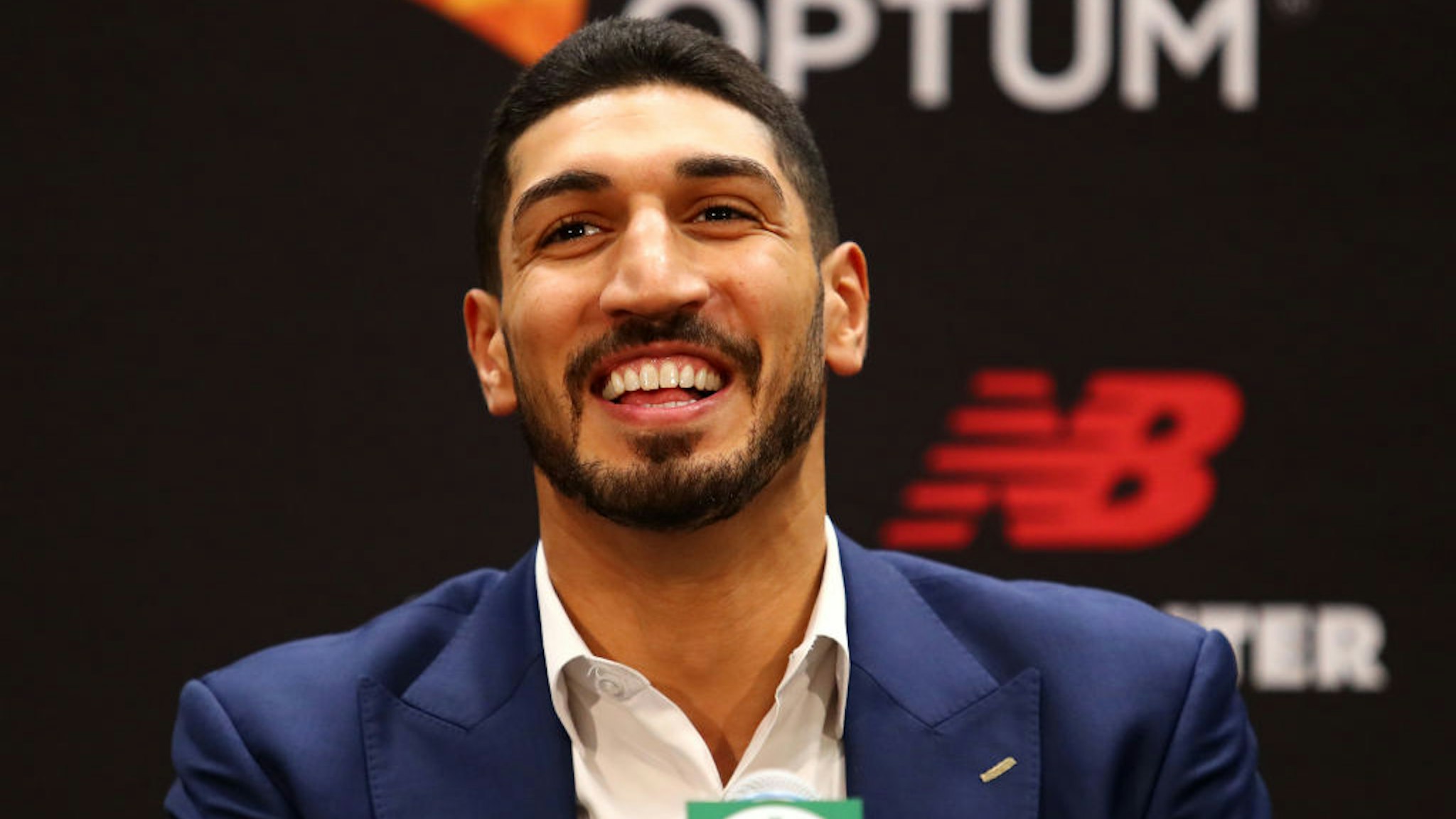 Enes Kanter reacts during a press conference as he is introduced as a member of the Boston Celtics at the Auerbach Center at New Balance World Headquarters on July 17, 2019 in Boston, Massachusetts.