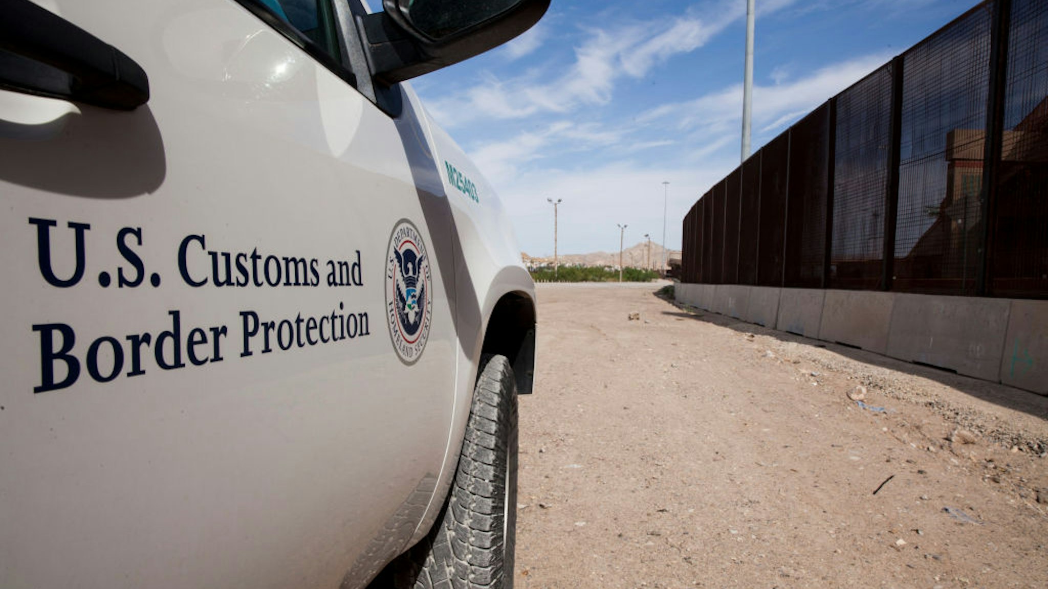 A Customs and Border Protection vehicle patrols the border fence in El Paso, Texas on Aug. 23, 2019.