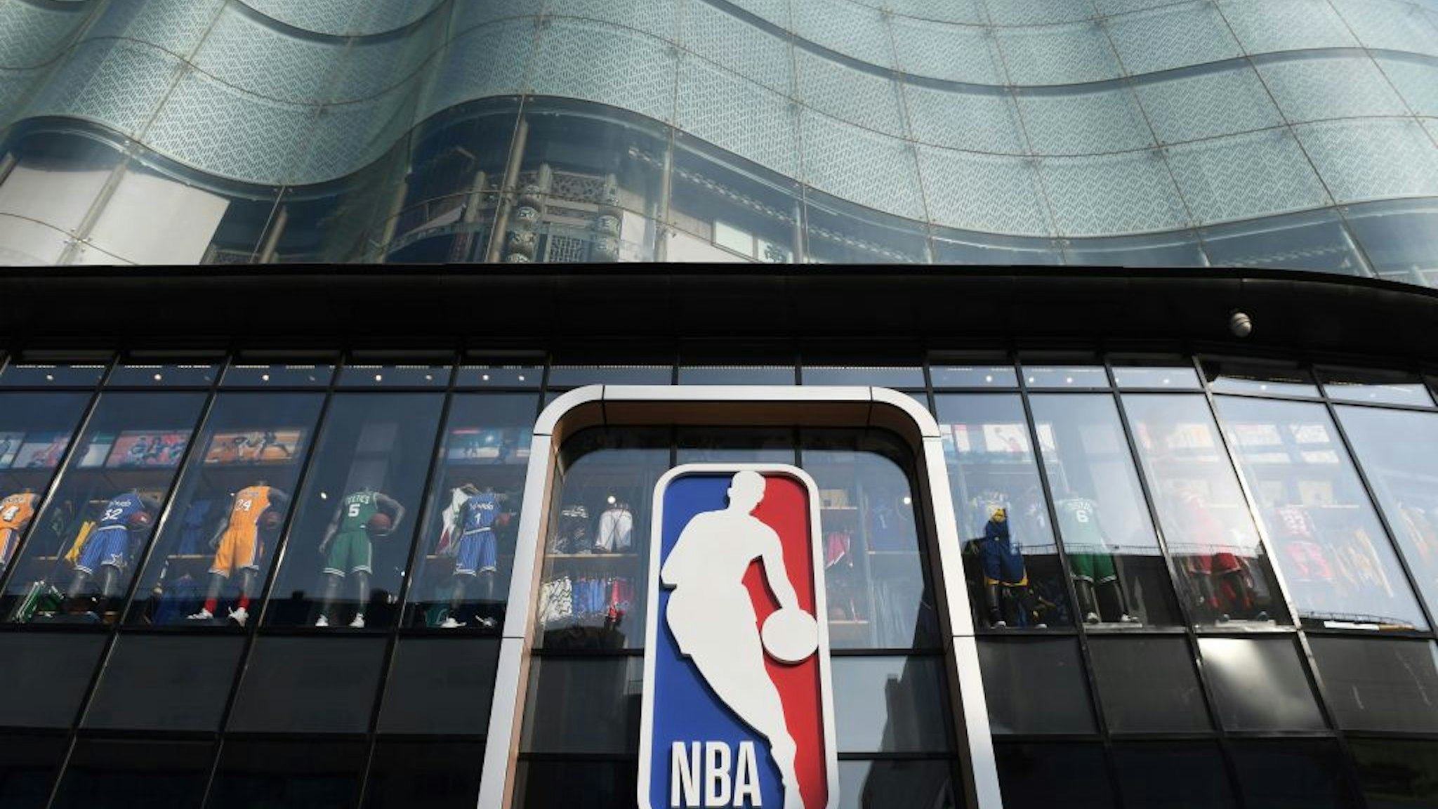 The National Basketball Association (NBA) store is seen in Beijing on October 9, 2019. - Chinese state media slammed the NBA for an "about-face" on October 9 after the body said it would not apologise for a tweet by the Houston Rockets General Manager supporting pro-democracy protests in Hong Kong.