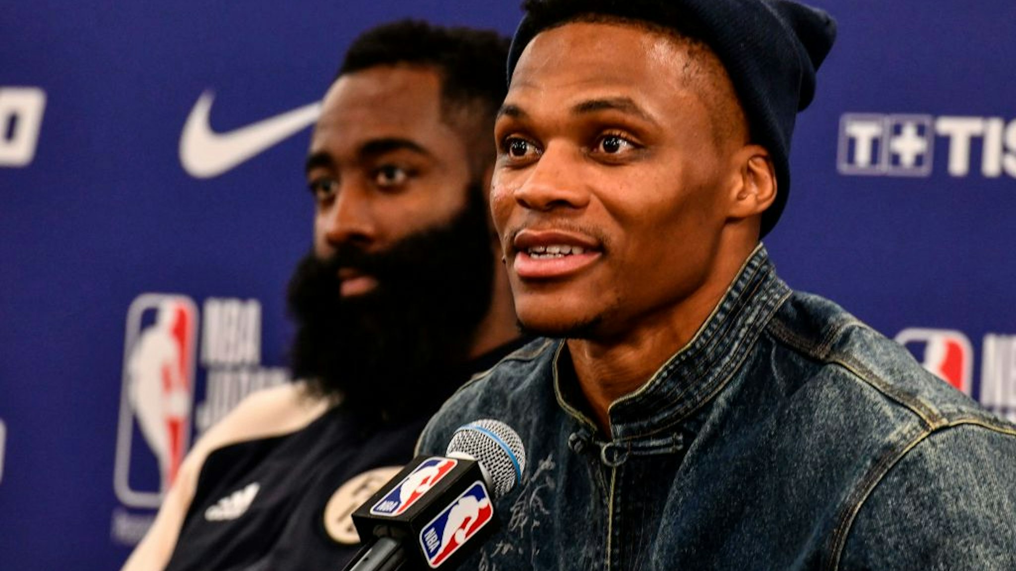 Houston's guard Russel Westbrook (R) answers questions beside James Harden (L) during a press conference after the NBA Japan Games 2019 pre-season basketball match between Houston Rockets and Toronto Raptors in Saitama, northern suburb of Tokyo on October 10, 2019.