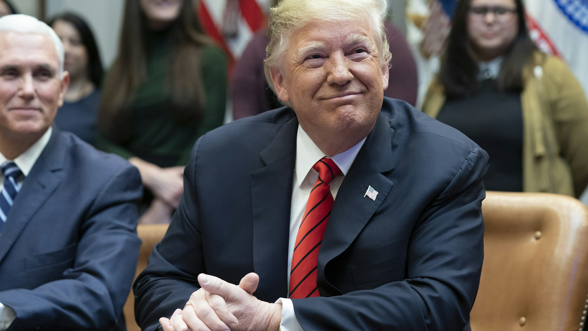 U.S. President Donald Trump smiles during a meeting at the White House in Washington, D.C., U.S., on Friday, Oct. 18, 2019. Trump gave a congratulatory call to National Aeronautics and Space Administration (NASA) astronauts Jessica Meir and Christina Koch after the first all-female spacewalk. Photographer: Chris Kleponis/Polaris/Bloomberg via Getty Images