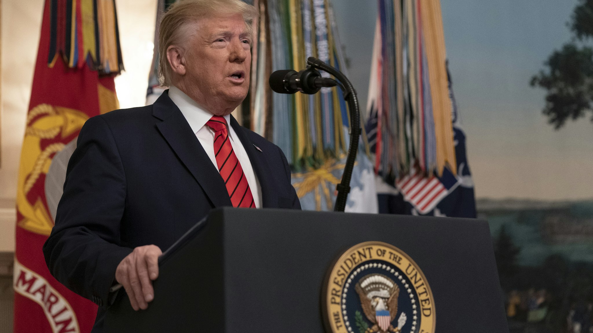 U.S. President Donald Trump speaks during a press conference in the Diplomatic Room of the White House in Washington, D.C., U.S., on Sunday, Oct. 27, 2019. Trump said Abu Bakr al-Baghdadi is dead after a U.S. military raid in northern Syria that left the Islamic State leader "in utter fear, in total panic and dread" in his final moments. Photographer: Chris Kleponis/Sipa USA/Bloomberg via Getty Images
