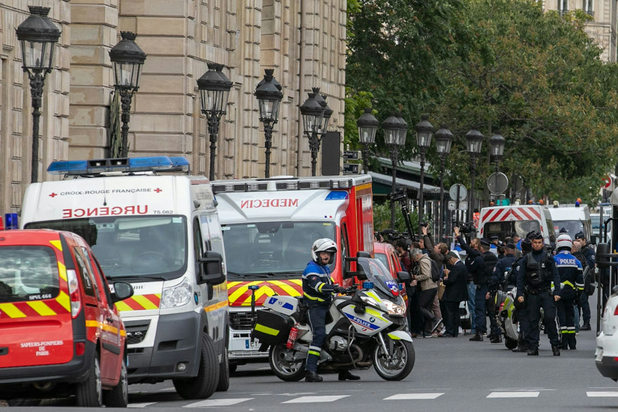 Journalists gather near Paris Police headquarters after four officers were killed in a knife attack on October 3, 2019 in Paris, France.