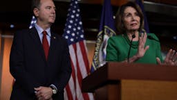House Democrats Hold Meeting To Discuss Impeachment Inquiry WASHINGTON, DC - OCTOBER 15: U.S. Speaker of the House Rep. Nancy Pelosi (D-CA) speaks as Chairman of House Intelligence Committee Rep. Adam Schiff (D-CA) listens during a news conference at the U.S. Capitol October 15, 2019 in Washington, DC. Pelosi said she is holding off on a full House vote to authorize an impeachment inquiry against President Donald Trump.