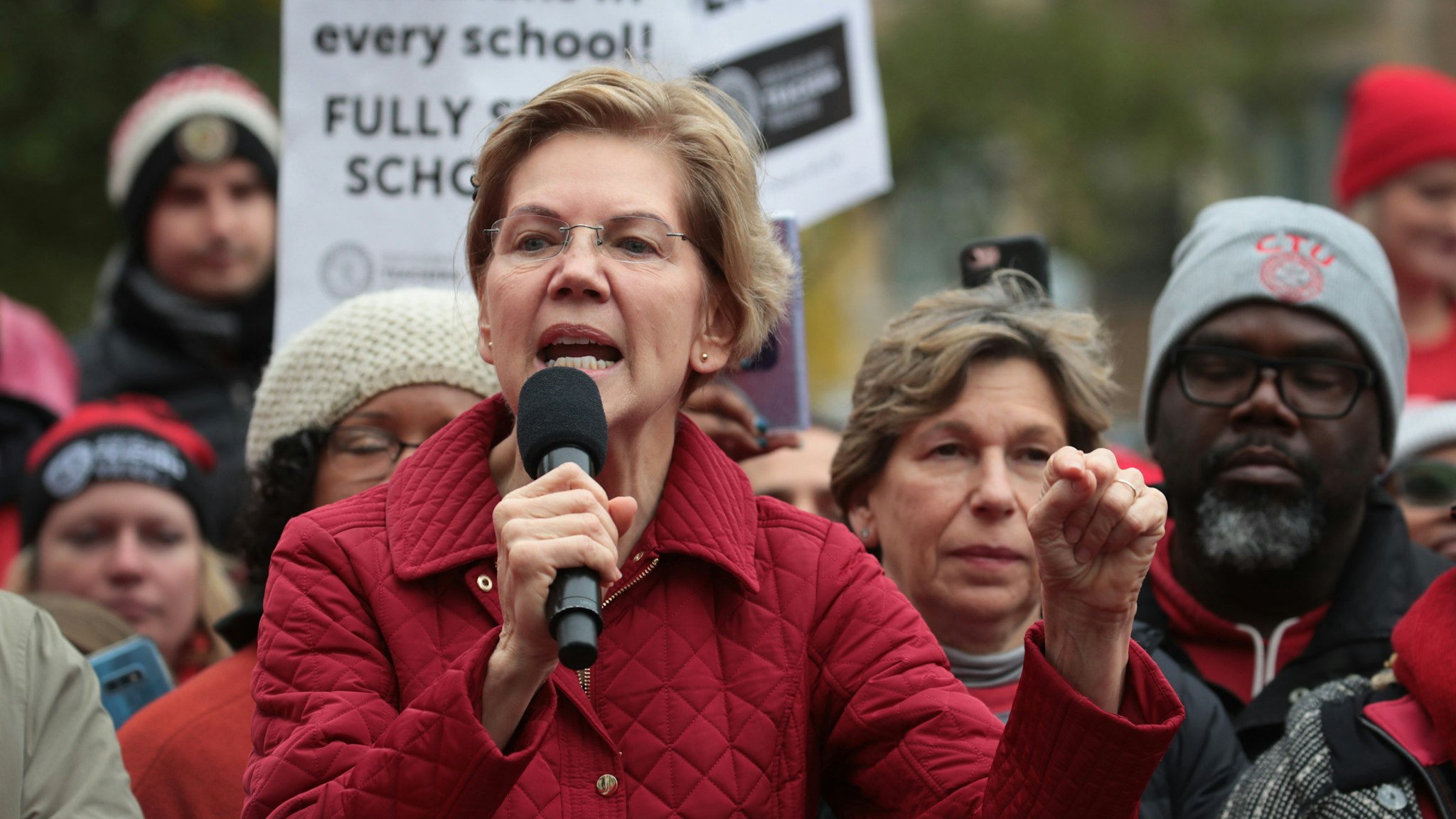 Democratic presidential candidate Sen. Elizabeth Warren (D-MA) visits with striking Chicago teachers at Oscar DePriest Elementary School on October 22, 2019 in Chicago, Illinois. About 25,000 Chicago school teachers went on strike last week after the Chicago Teachers Union (CTU) failed to reach a contract agreement with the city. With about 300,000 students, Chicago has the third largest public school system in the nation. (Photo by Scott Olson/Getty Images)