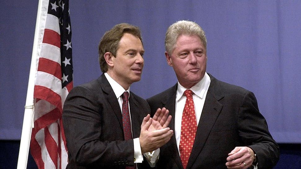 US President Bill Clinton (R) and British Prime Mi US President Bill Clinton (R) and British Prime Minister Tony Blair stand together 14 December 2000 at Warwick University, near Coventry, where the American leader gave a speech on foreign affairs.
