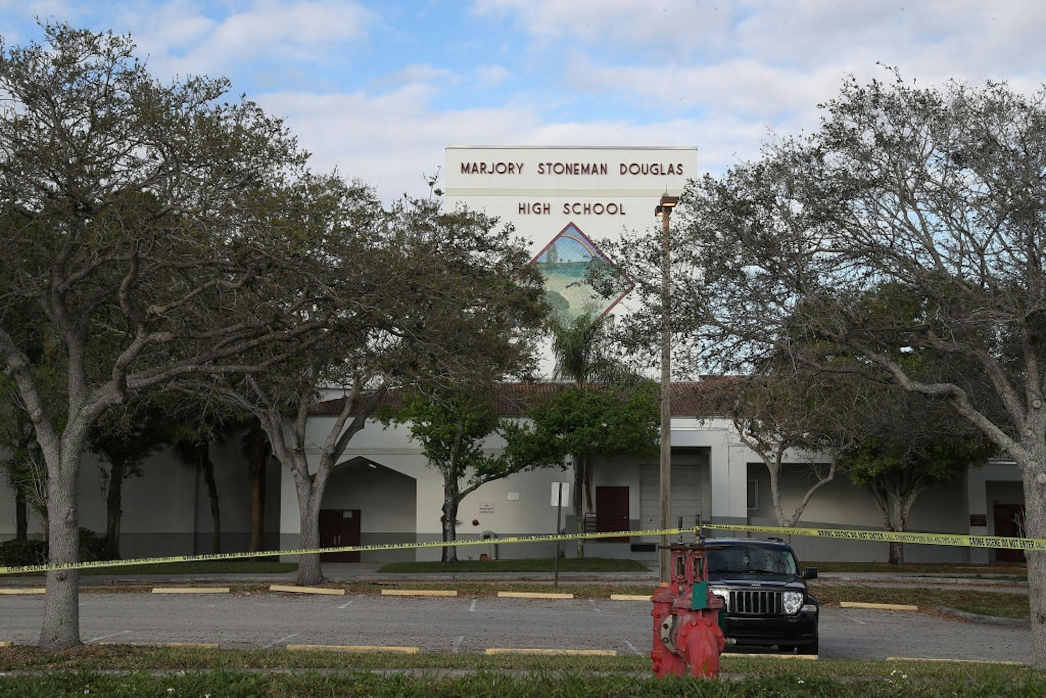PARKLAND, FL - FEBRUARY 18: The front of Marjory Stoneman Douglas High School is seen on February 18, 2018 in Parkland, Florida. Police arrested 19 year old former student Nikolas Cruz for the mass shooting that killed 17 people on February 14.