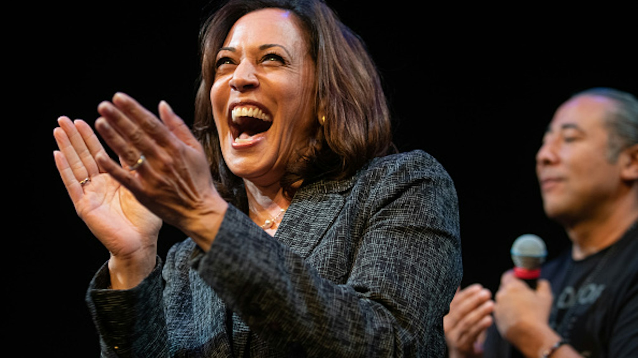 Senator Kamala Harris, a Democrat from California and 2020 presidential candidate, reacts during a Gun Safety Round table in Seattle, Washington, U.S., on Friday, Sept. 27, 2019. Kamala's gun safety agenda includes universal background checks, an assault weapons ban, and the repeal of the NRA's corporate gun manufacturer immunity shield.