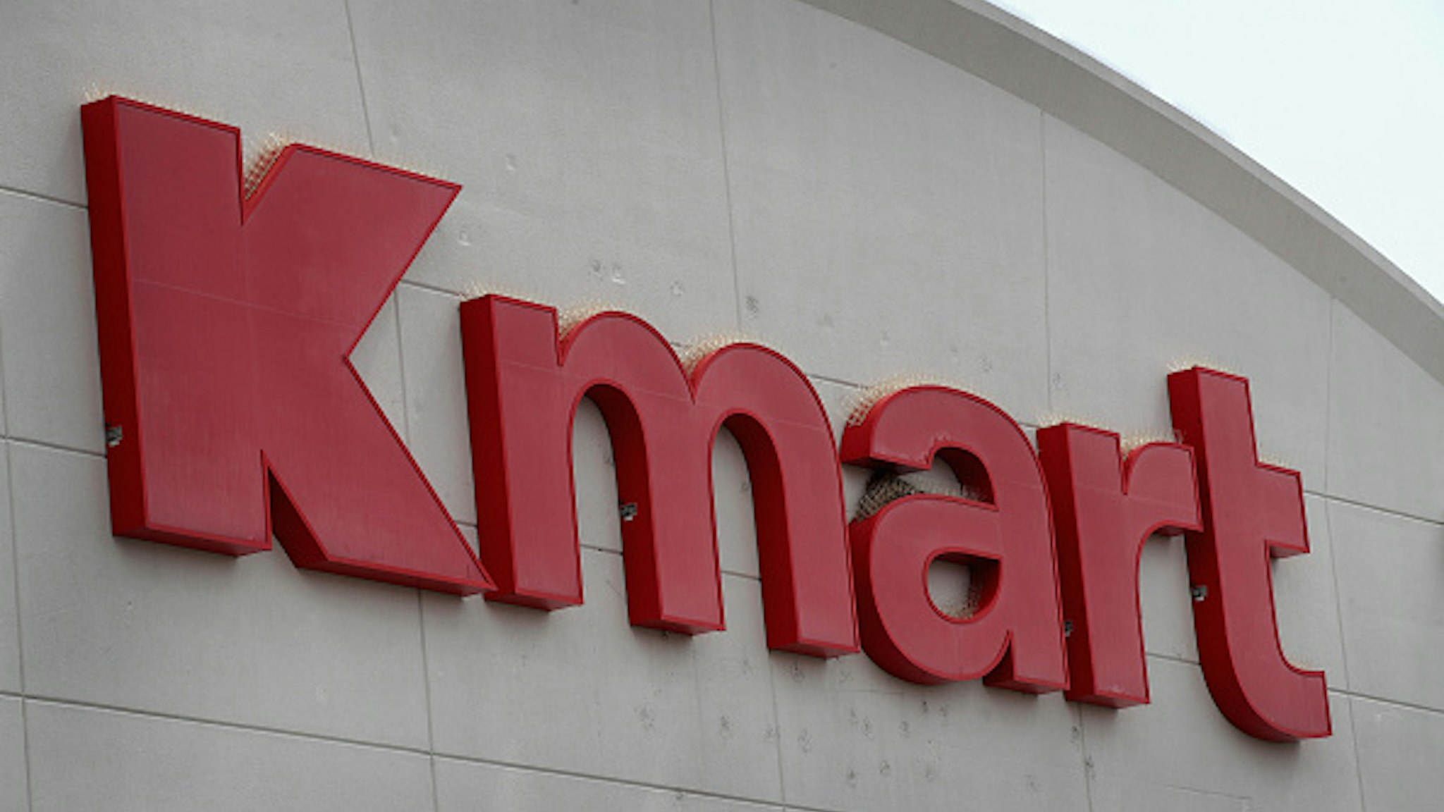 ELMHURST, IL - AUGUST 24: A sign hangs above a Kmart store on August 24, 2017 in Elmhurst, Illinois. Sears Holdings Corporation, the owner of Kmart, said today it was planning on closing another 28 Kmart store including this Elmhurst location.