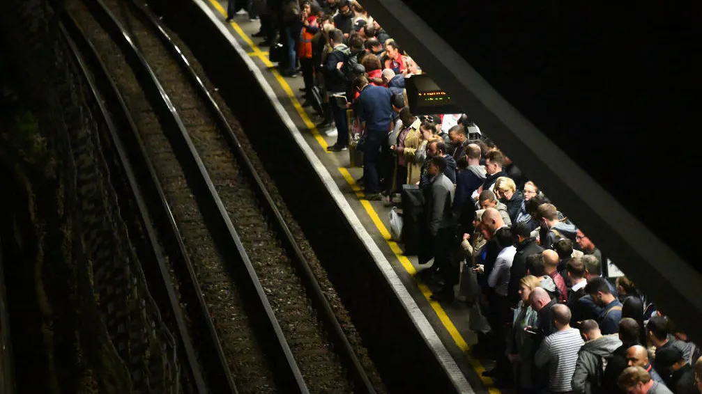 WATCH: Furious London Commuters Pull Climate Change Activists Off Train