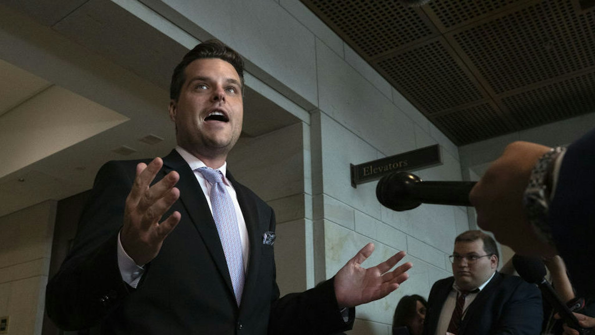 Representative Matt Gaetz, a Republican from Florida, speaks to members of the media after leaving a closed-door testimony with Fiona Hill, former National Security Council Russia expert, on Capitol Hill in Washington, D.C., U.S., on Monday, Oct. 14, 2019. Hill's testimony kicks off what could be a pivotal week in the probe, with at least three other witnesses scheduled to appear before the Intelligence, Foreign Affairs and Oversight and Reform committees. Photographer: Stefani Reynolds/Bloomberg