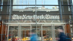 The New York Times Headquarters Pedestrians pass in front of the New York Times Co. headquarters in New York, U.S., on Sunday, Feb. 3, 2019. New York Times Co. is scheduled to release earnings figures on February 6. Photographer: Tiffany Hagler-Geard/Bloomberg