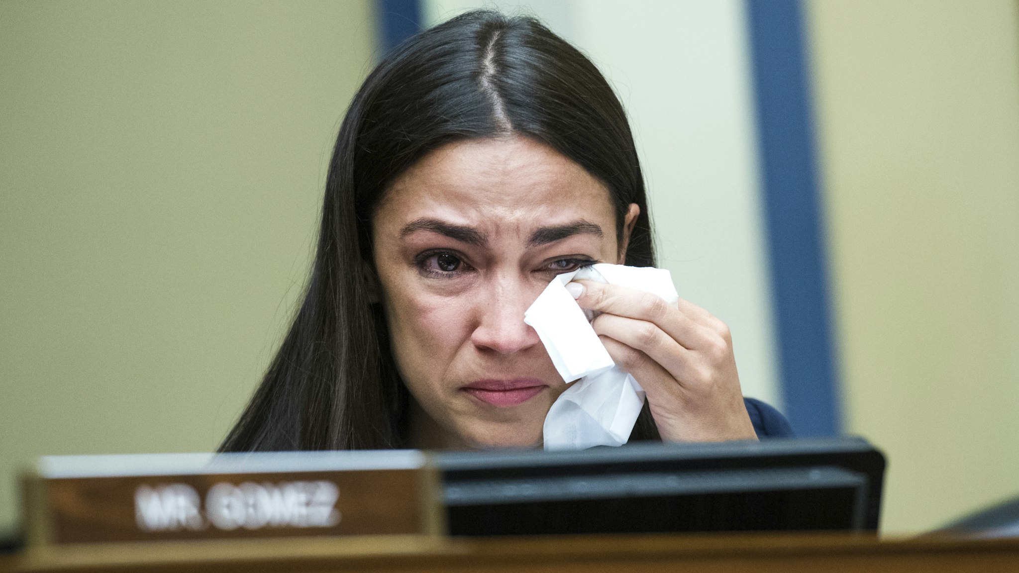Rep. Alexandria Ocasio-Cortez, D-N.Y., listens to Yazmin Juárez, an migrant from Guatemala whose 19-month old daughter, Mariee, died after becoming sick at an Immigration and Customs Enforcement (ICE) detention facility, testify during a House Oversight and Reform Subcommittee on Civil Rights and Civil Liberties hearing in Rayburn Building titled "Kids in Cages: Inhumane Treatment at the Border," on Wednesday, July 10, 2019.